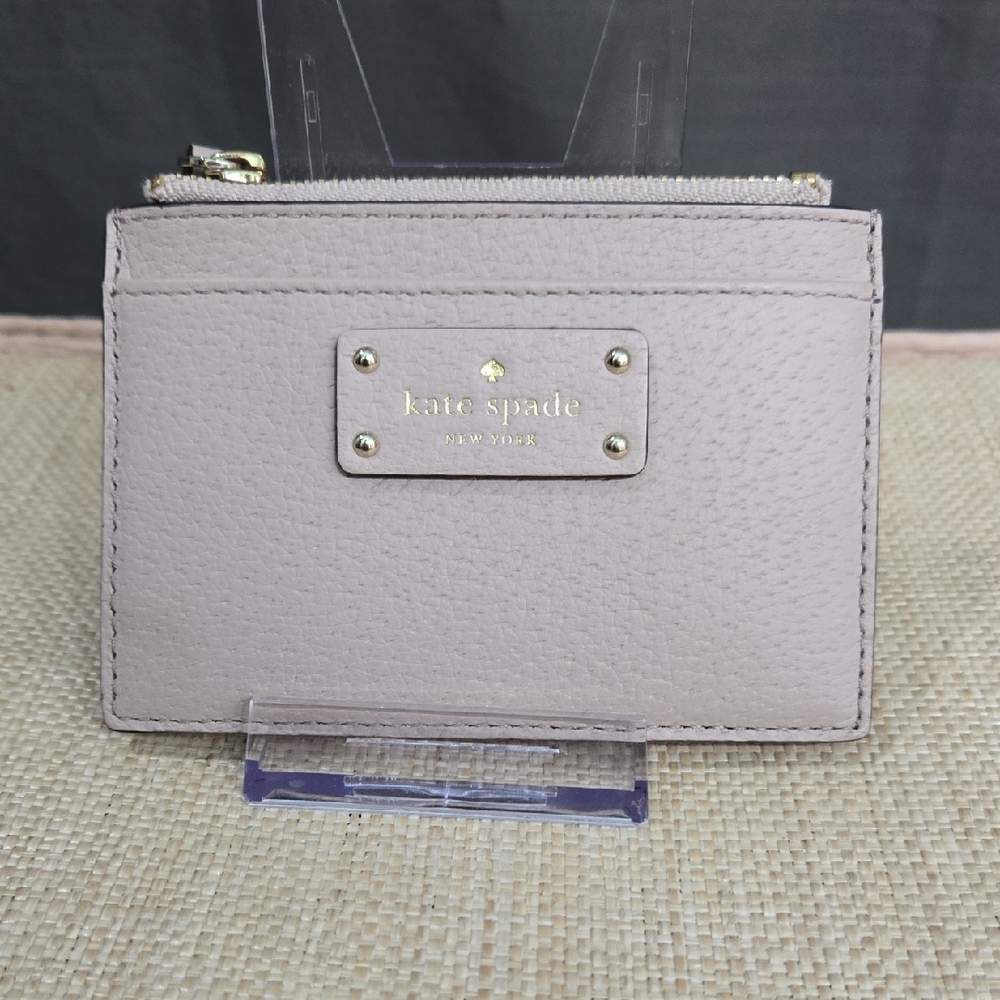 kate spade blush Gray pebbled leather card case with gold logo